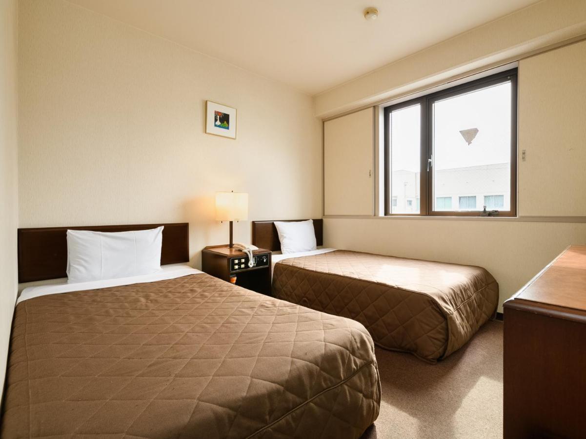 Tabist Kameyama Daiichi Hotel Bagian luar foto