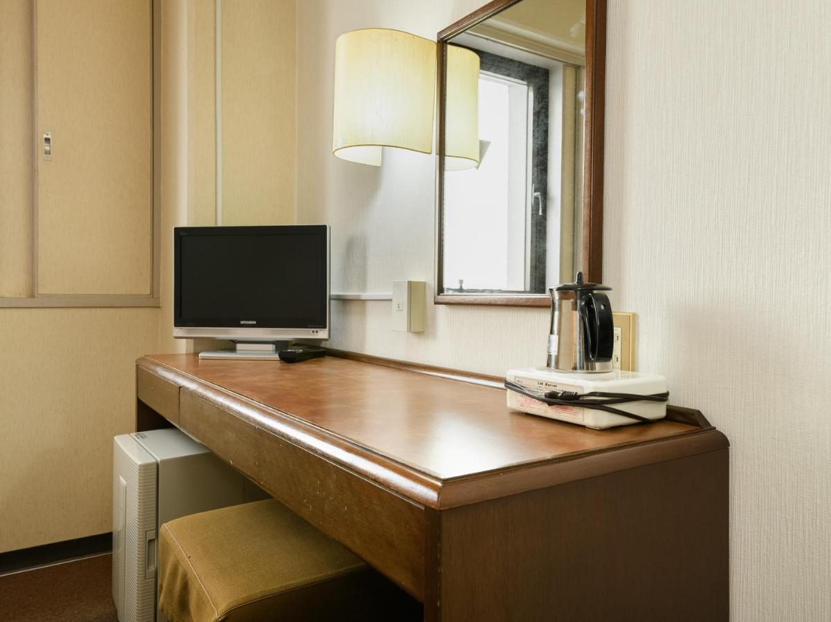 Tabist Kameyama Daiichi Hotel Bagian luar foto
