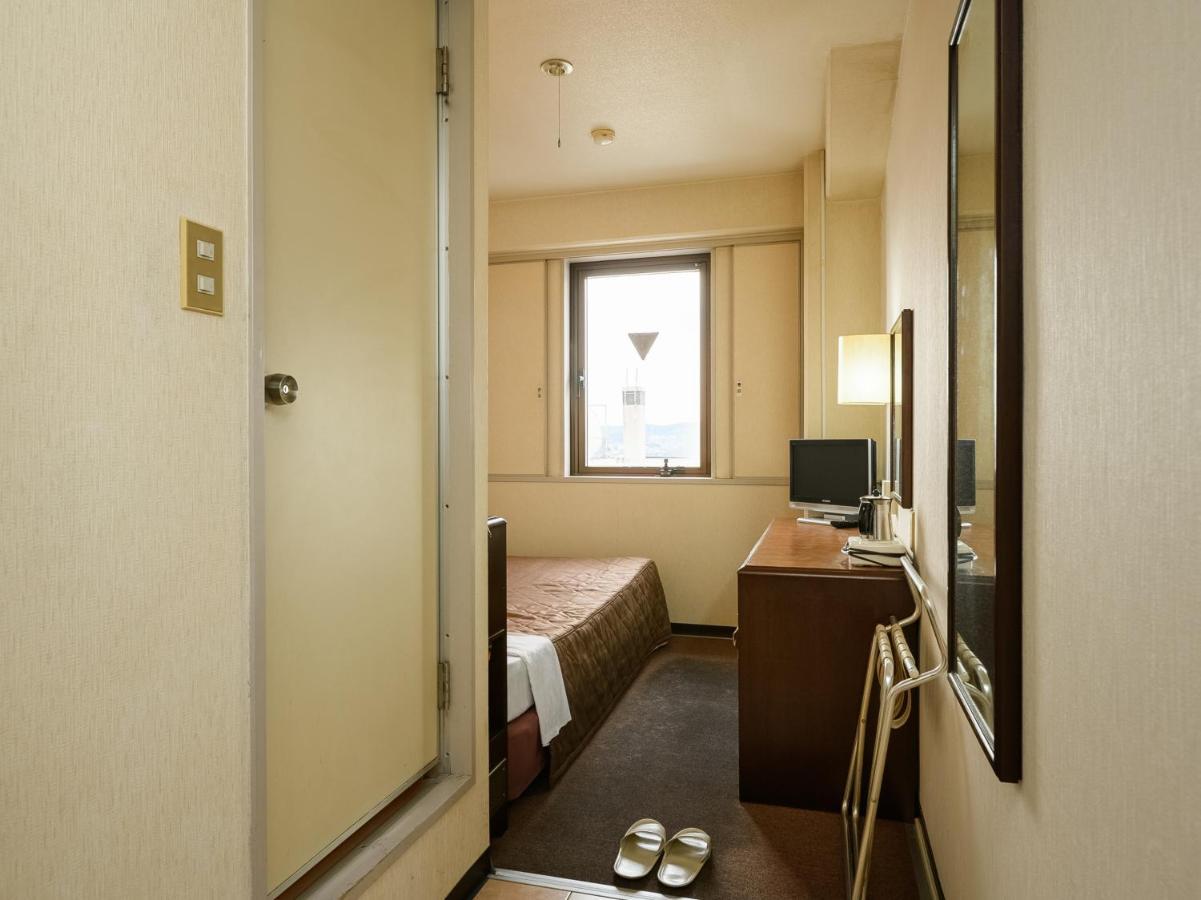 Tabist Kameyama Daiichi Hotel Bagian luar foto
