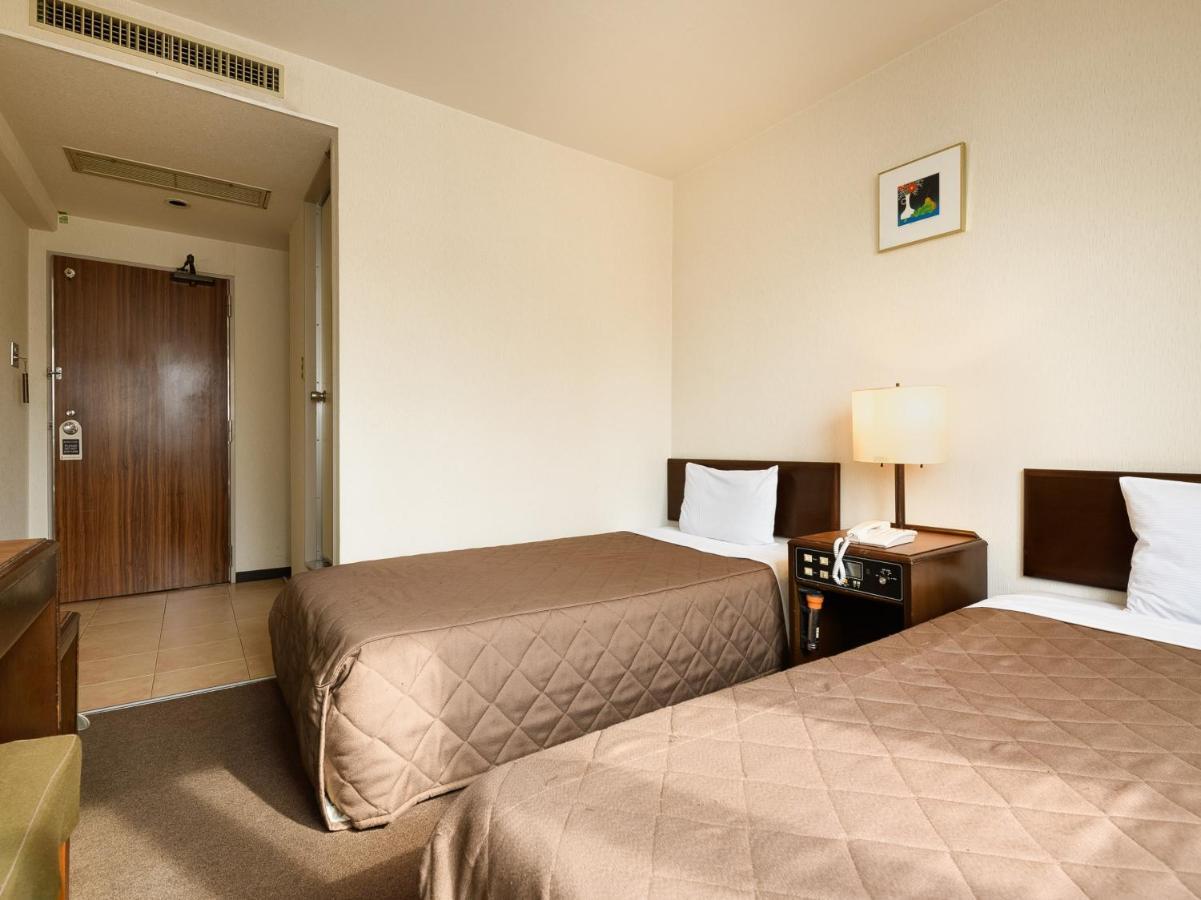 Tabist Kameyama Daiichi Hotel Bagian luar foto