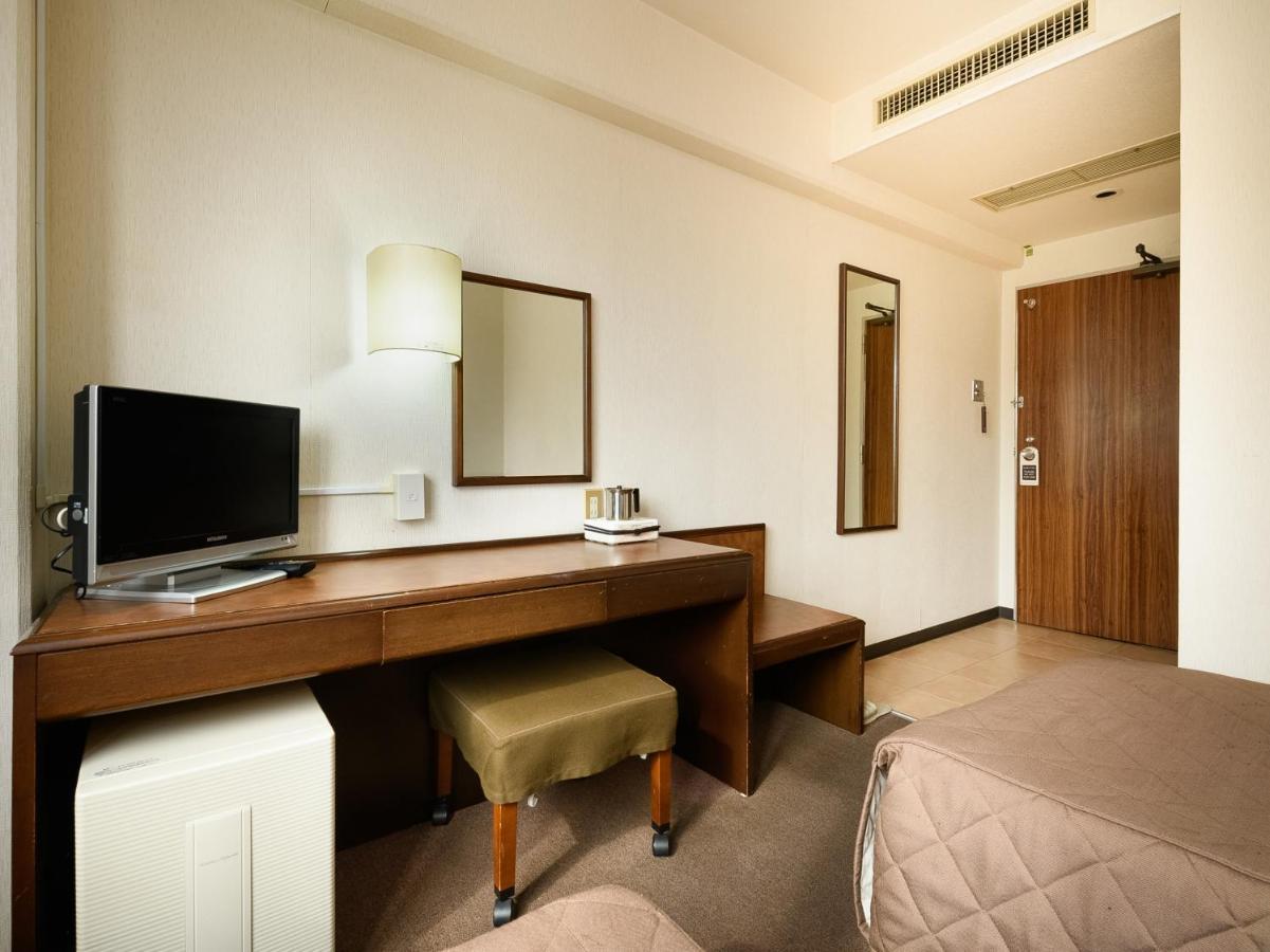 Tabist Kameyama Daiichi Hotel Bagian luar foto