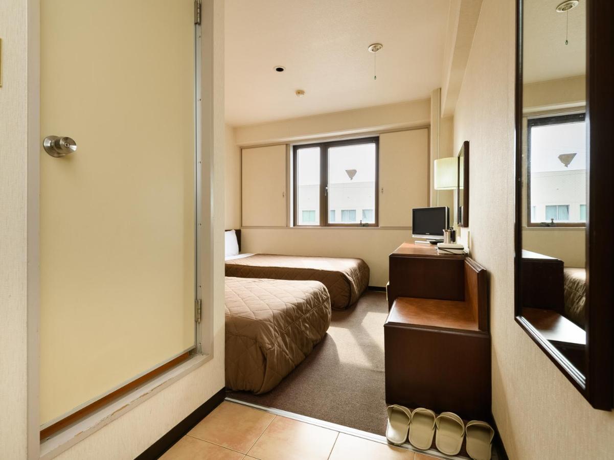 Tabist Kameyama Daiichi Hotel Bagian luar foto