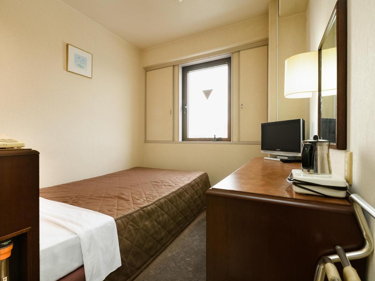 Tabist Kameyama Daiichi Hotel Bagian luar foto