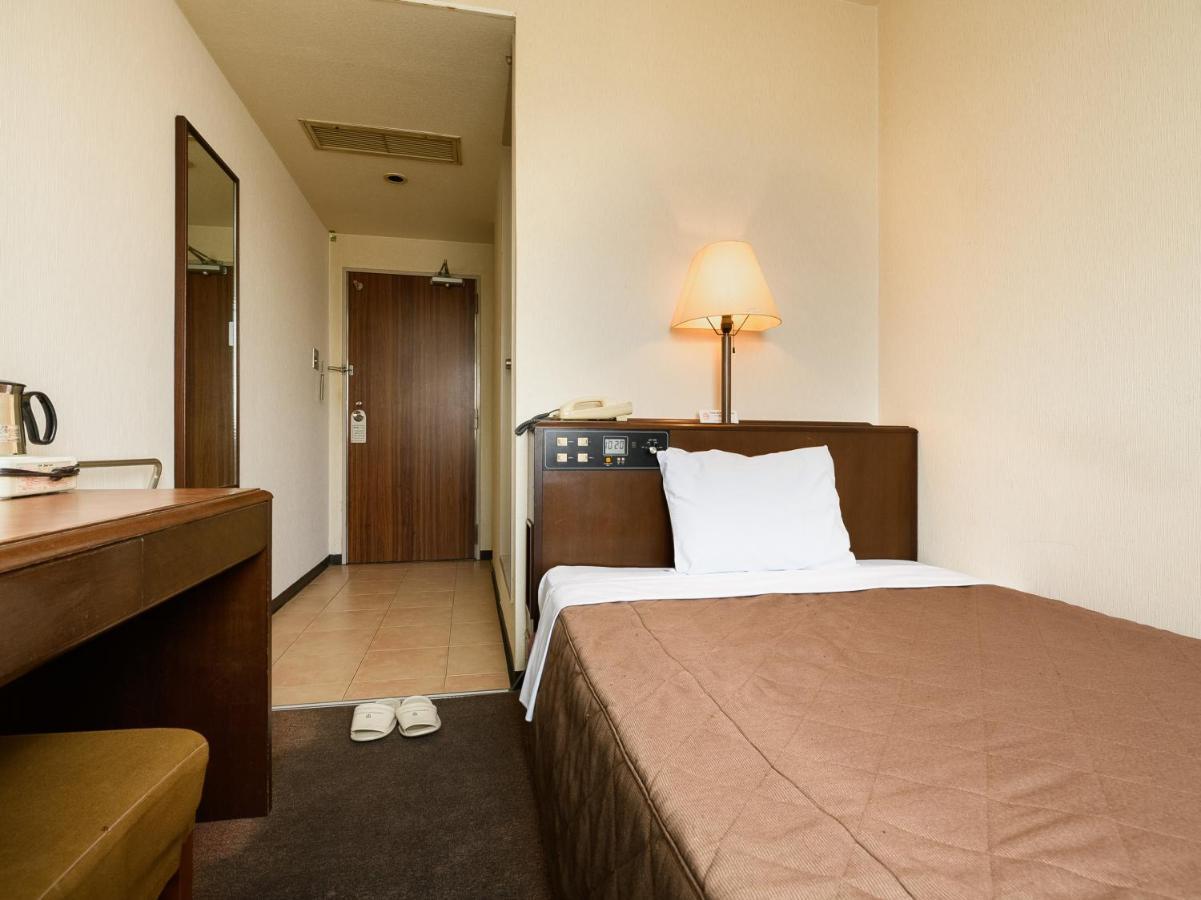 Tabist Kameyama Daiichi Hotel Bagian luar foto