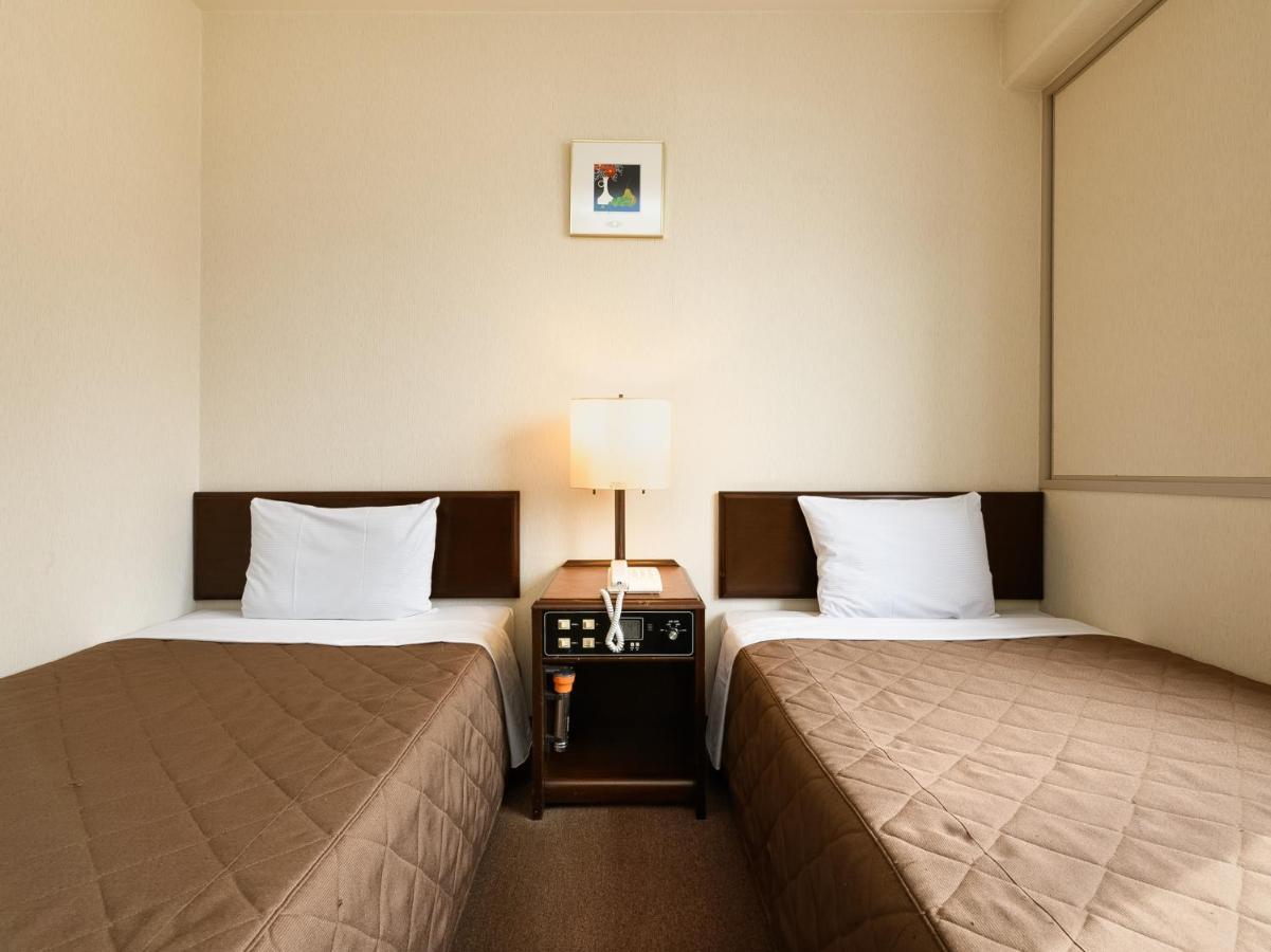 Tabist Kameyama Daiichi Hotel Bagian luar foto